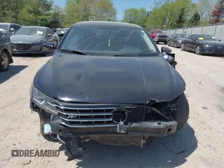 2018 Volkswagen Passat S z VIN 1VWAA7A39JC006444, wystawiony jako IAAI lot #42233008 z przebiegiem 136 828 mil mil oraz . Historia ofert i sprzedaży dostępna na DreamBid. Obrazek 12.