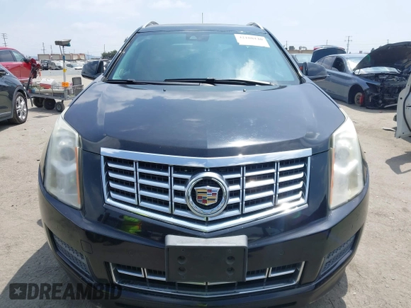 2014 Cadillac SRX Luxury Collection with VIN 3GYFNBE34ES639647, listed as a IAAI auction lot 42108140 with 99,740 mi miles and . Bid and sale history available at DreamBid. Image 13.