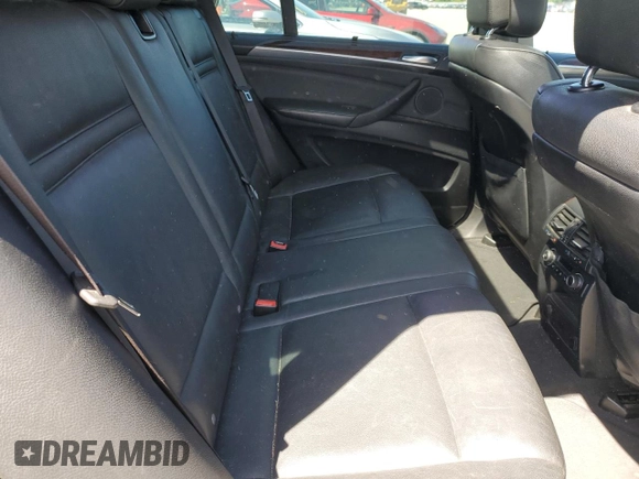 2012 BMW X5 35d z VIN 5UXZW0C59CL670242, wystawiony jako Copart lot #57638165 z przebiegiem 174 430 mil mil oraz Szkoda całkowita • Salvage title. Historia ofert i sprzedaży dostępna na DreamBid. Obrazek 11.