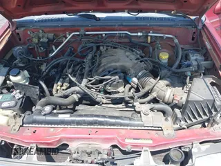 2000 Nissan Frontier XE z VIN 1N6ED27Y3YC382842, wystawiony jako IAAI lot #42343459 z przebiegiem 172 454 mil mil oraz . Historia ofert i sprzedaży dostępna na DreamBid. Obrazek 10.