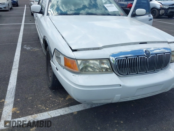 2001 Mercury Grand Marquis LS with VIN 2MEFM75W71X614856, listed as a IAAI auction lot 42195921 with 113,352 mi miles and . Bid and sale history available at DreamBid. Image 6.