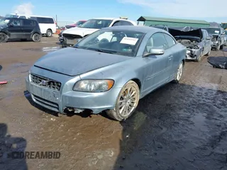 2009 Volvo C70 z VIN YV1MC67269J077153, wystawiony jako IAAI lot #41432312 z przebiegiem 67 700 mil mil oraz . Historia ofert i sprzedaży dostępna na DreamBid. Obrazek 18.
