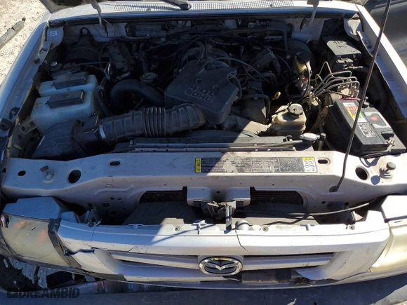 2003 Mazda B-Series 2WD Truck DS with VIN 4F4YR46E13TM02980, listed as a Copart auction lot 81691084 with 179,234 mi miles and Salvage Title. Bid and sale history available at carsss.com. Image 11.