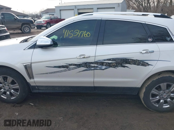 2015 Cadillac SRX Luxury Collection with VIN 3GYFNBE34FS586823, listed as a IAAI auction lot 41554760 with 176,425 mi miles and . Bid and sale history available at carsss.com. Image 14.