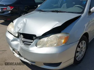 2004 Toyota Corolla CE with VIN 1NXBR32E14Z262676, listed as a IAAI auction lot 41992616 with 168,255 mi miles. Bid and sale history available at carsss.com. Image 6.