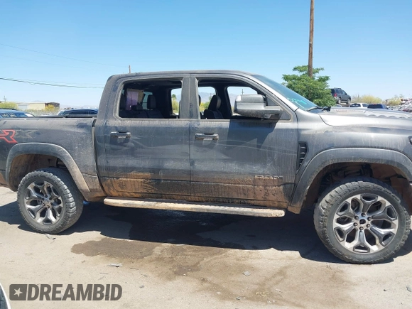 2022 Ram 1500 TRX with VIN 1C6SRFU97NN353587, listed as a IAAI auction lot 42174702 with 35,305 mi miles and . Bid and sale history available at DreamBid. Image 14.