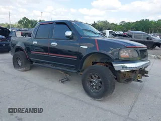 2003 Ford F-150 XLT with VIN 1FTRW08L73KA58913, listed as a IAAI auction lot 41907277 with 147,294 mi miles and . Bid and sale history available at DreamBid. Image 1.