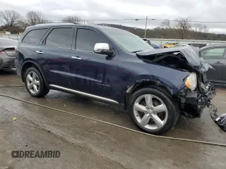 2013 Dodge Durango Citadel with VIN 1C4RDHEGXDC687475, listed as a Copart auction lot 84757144 with 208,217 mi miles and Salvage title. Bid and sale history available at DreamBid. Image 4.