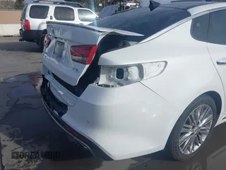 2016 Kia Optima SXL Turbo with VIN 5XXGV4L20GG074869, listed as a IAAI auction lot 41212808 with 82,884 mi miles. Bid and sale history available at carsss.com. Image 18.