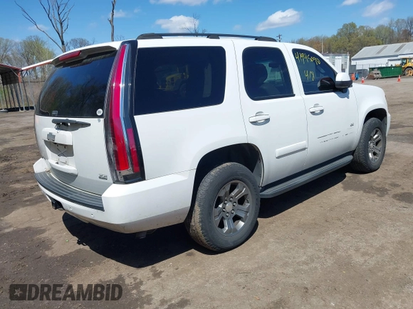 2007 Chevrolet Tahoe LTZ with VIN 1GNFK13007J149042, listed as a IAAI auction lot 41995090 with 216,748 mi miles and . Bid and sale history available at DreamBid. Image 4.