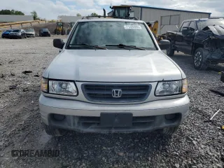 2000 Honda Passport LX with VIN 4S6CK58WXY4411135, listed as a Copart auction lot 71426994 with 214,051 mi miles and Salvage Title. Bid and sale history available at carsss.com. Image 5.
