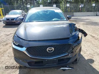 2023 Mazda CX-30 S z VIN 3MVDMBAM0PM519901, wystawiony jako IAAI lot #42255344 z przebiegiem 20 839 mil mil oraz . Historia ofert i sprzedaży dostępna na DreamBid. Obrazek 12.