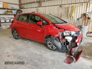 2015 Honda Fit EX-L z VIN 3HGGK5H88FM701702, wystawiony jako Copart lot #56390935 z przebiegiem 111 410 mil mil oraz Szkoda całkowita • Salvage title. Historia ofert i sprzedaży dostępna na DreamBid. Obrazek 4.