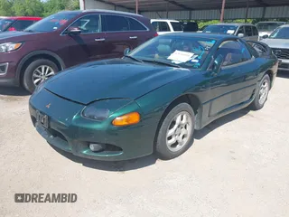 1998 Mitsubishi 3000GT with VIN JA3AM44H2WY000932, listed as a IAAI auction lot 42036054 with 125,061 mi miles and . Bid and sale history available at DreamBid. Image 2.