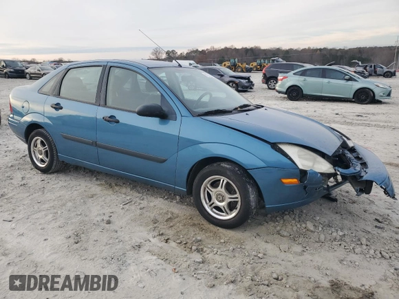 2001 Ford Focus LX with VIN 1FAHP33P01W332260, listed as a Copart auction lot 83221654 with 104,028 mi miles and Salvage Title. Bid and sale history available at DreamBid. Image 4.