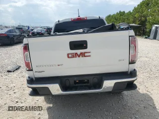 2020 GMC Canyon 2WD SLT z VIN 1GTG5DEN6L1172883, wystawiony jako Copart lot #71844604 z przebiegiem 81 504 mil mil oraz Czysty tytuł • Clean title. Historia ofert i sprzedaży dostępna na DreamBid. Obrazek 6.