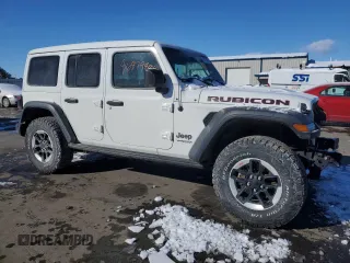 2021 Jeep Wrangler Unlimited Rubicon with VIN 1C4HJXFGXMW728148, listed as a Copart auction lot 45118085 with 97,754 mi miles and Salvage Title. Bid and sale history available at carsss.com. Image 4.