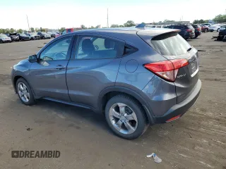 2018 Honda HR-V LX with VIN 3CZRU6H38JG703401, listed as a Copart auction lot 70567114 with 106,672 mi miles and Salvage Title. Bid and sale history available at carsss.com. Image 2.