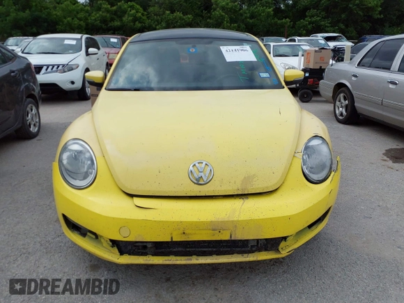 2013 Volkswagen Beetle 2.5L w/Sun/Sound/Nav with VIN 3VWJX7AT2DM680808, listed as a IAAI auction lot 42141906 with 113,399 mi miles and . Bid and sale history available at DreamBid. Image 12.