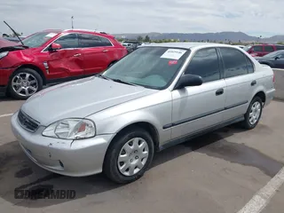 1999 Honda Civic LX with VIN JHMEJ6671XS003027, listed as a IAAI auction lot 41825146 with 197,764 mi miles and . Bid and sale history available at DreamBid. Image 17.