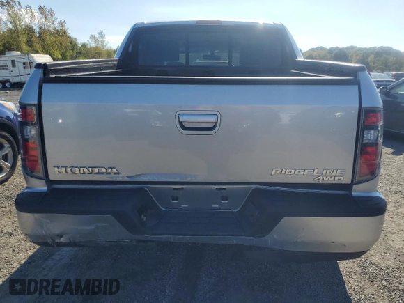 2012 Honda Ridgeline RTL with VIN 5FPYK1F55CB452206, listed as a Copart auction lot 74694204 with 128,226 mi miles and Clean Title. Bid and sale history available at carsss.com. Image 6.