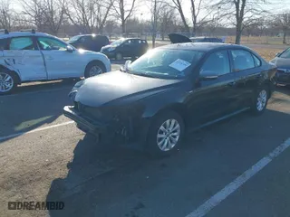 2015 Volkswagen Passat 1.8T Wolfsburg Ed with VIN 1VWAT7A34FC004649, listed as a IAAI auction lot 41728398 with 91,651 mi miles. Bid and sale history available at carsss.com. Image 2.