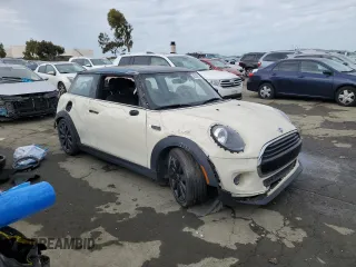 2020 MINI Hardtop Cooper with VIN WMWXR3C03L2M73723, listed as a Copart auction lot 45218215 with 67,807 mi miles and Salvage title. Bid and sale history available at DreamBid. Image 4.