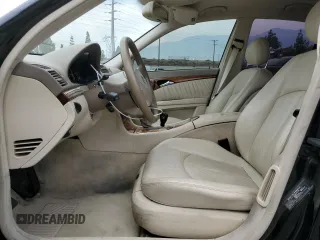 2003 Mercedes-Benz E-Class 5.0L with VIN WDBUF70J53A146263, listed as a Copart auction lot 62768664 with 73,790 mi miles and Salvage Title. Bid and sale history available at carsss.com. Image 7.