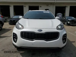 2019 Kia Sportage EX z VIN KNDPNCAC7K7522953, wystawiony jako Copart lot #54906835 z przebiegiem 128 011 mil mil oraz Szkoda całkowita • Salvage title. Historia ofert i sprzedaży dostępna na DreamBid. Obrazek 5.