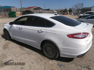 2016 Ford Fusion Titanium with VIN 3FA6P0K93GR331947, listed as a IAAI auction lot 41828409 with 181,555 mi miles and . Bid and sale history available at DreamBid. Image 3.