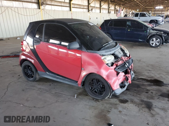 2013 Smart fortwo Pure with VIN WMEEJ3BA2DK663995, listed as a Copart auction lot 54629895 with Not Provided miles and Salvage Title. Bid and sale history available at DreamBid. Image 4.