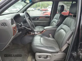 2004 GMC Envoy SLT with VIN 1GKDT13S842210243, listed as a Copart auction lot 55672595 with 148,232 mi miles and Clean Title. Bid and sale history available at DreamBid. Image 7.