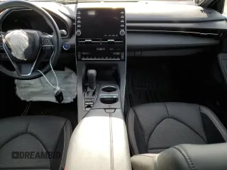 2019 Toyota Avalon Limited Hybrid z VIN 4T1B21FBXKU003688, wystawiony jako Copart lot #69697502 z przebiegiem 48 950 mil mil oraz . Historia ofert i sprzedaży dostępna na DreamBid. Obrazek 8.