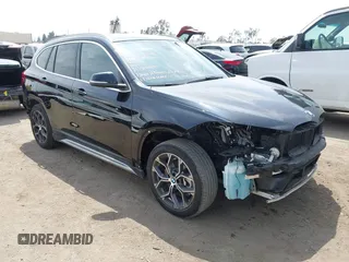 2021 BMW X1 sDrive28i with VIN WBXJG7C0XM5T45715, listed as a IAAI auction lot 42014499 with 23,793 mi miles and . Bid and sale history available at DreamBid. Image 1.