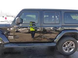 2020 Jeep Wrangler Unlimited Sahara with VIN 1C4HJXEN7LW230214, listed as a IAAI auction lot 41812466 with 59,004 mi miles. Bid and sale history available at carsss.com. Image 15.