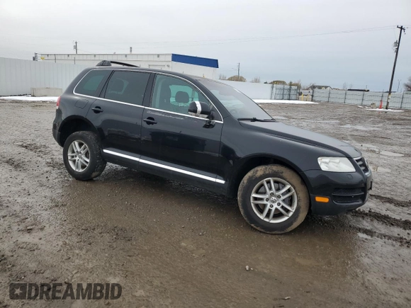 2004 Volkswagen Touareg z VIN WVGBC77LX4D062055, wystawiony jako Copart lot #45960445 z przebiegiem 201 819 mil mil oraz Szkoda całkowita • Salvage title. Historia ofert i sprzedaży dostępna na DreamBid. Obrazek 4.