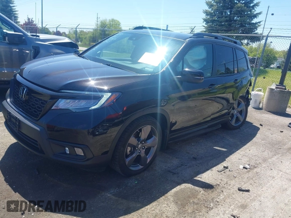 2021 Honda Passport Touring с VIN 5FNYF7H92MB010789, выставлен на аукционе IAAI как лот 42240529 с пробегом 43 184 миль миль и . История ставок и продаж доступна на DreamBid. Изображение 2.