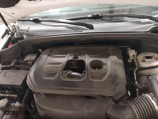2018 Jeep Grand Cherokee Laredo E with VIN 1C4RJFAG0JC105804, listed as a IAAI auction lot 41587036 with 107,601 mi miles. Bid and sale history available at carsss.com. Image 10.