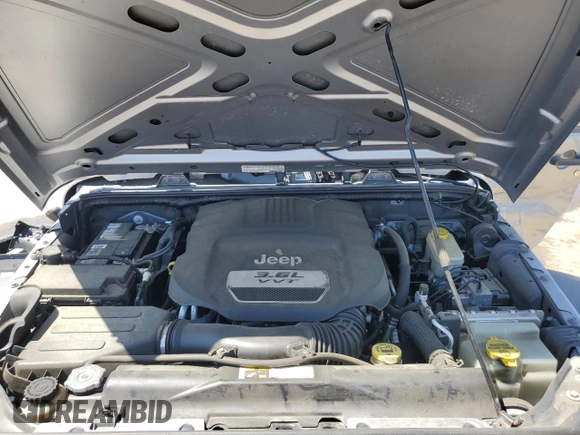2013 Jeep Wrangler Sport z VIN 1C4AJWAG2DL649500, wystawiony jako Copart lot #52859775 z przebiegiem 70 254 mil mil oraz Szkoda całkowita • Salvage title. Historia ofert i sprzedaży dostępna na DreamBid. Obrazek 12.