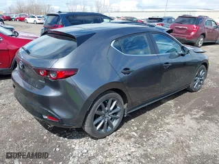 2021 Mazda Mazda3 Hatchback Select with VIN JM1BPBKLXM1337797, listed as a IAAI auction lot 42018058 with 46,763 mi miles. Bid and sale history available at carsss.com. Image 4.