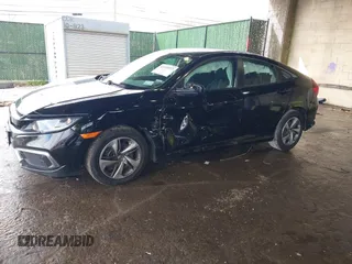 2020 Honda Civic LX z VIN 2HGFC2F61LH587612, wystawiony jako IAAI lot #41955072 z przebiegiem 89 476 mil mil oraz . Historia ofert i sprzedaży dostępna na DreamBid. Obrazek 17.