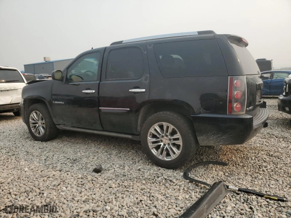 2007 GMC Yukon Denali with VIN 1GKFK63847J299770, listed as a Copart auction lot 71039214 with 195,448 mi miles and Salvage Title. Bid and sale history available at carsss.com. Image 2.