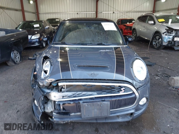 2014 MINI Hardtop S z VIN WMWXM7C50ET731680, wystawiony jako IAAI lot #41691317 z przebiegiem 47 205 mil mil oraz . Historia ofert i sprzedaży dostępna na DreamBid. Obrazek 12.