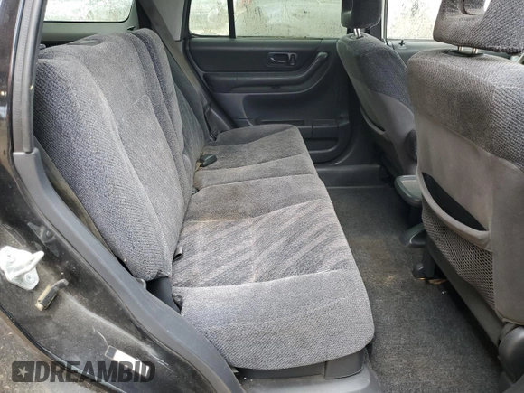 1999 Honda CR-V LX z VIN JHLRD184XXC006554, wystawiony jako Copart lot #55513235 z przebiegiem 229 237 mil mil oraz Czysty tytuł • Clean title. Historia ofert i sprzedaży dostępna na DreamBid. Obrazek 11.