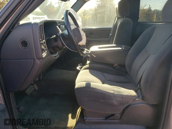 2004 Chevrolet Silverado 1500 LS with VIN 1GCEC14V04Z169624, listed as a Copart auction lot 77803554 with 143,212 mi miles and Salvage Title. Bid and sale history available at carsss.com. Image 7.
