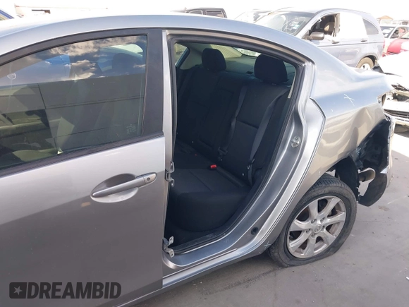 2010 Mazda 3 i SV with VIN JM1BL1SF4A1148543, listed as a IAAI auction lot 40110323 with 131,801 mi miles and . Bid and sale history available at DreamBid. Image 14.