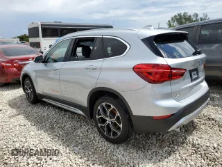 2021 BMW X1 sDrive28i with VIN WBXJG7C04M5S29295, listed as a Copart auction lot 48922203 with 14,214 mi miles. Bid and sale history available at carsss.com. Image 2.