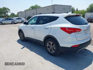 2014 Hyundai Santa Fe with VIN 5XYZUDLB9EG156555, listed as a IAAI auction lot 42721070 with 349,412 mi miles and . Bid and sale history available at DreamBid. Image 3.