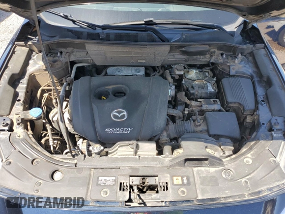 2018 Mazda CX-5 Grand Touring с VIN JM3KFBDM8J0344328, выставлен на аукционе Copart как лот 57665175 с пробегом 131 175 миль миль и Списание • Salvage title. История ставок и продаж доступна на DreamBid. Изображение 12.