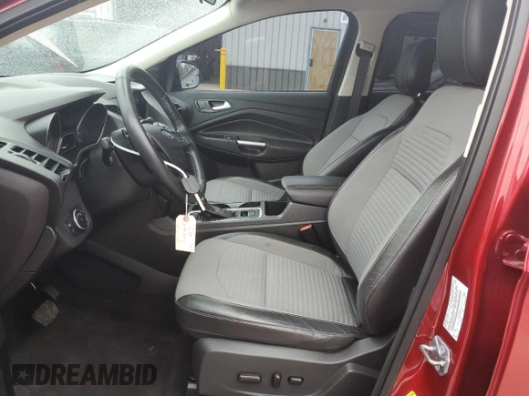2018 Ford Escape SE z VIN 1FMCU9GD4JUA49819, wystawiony jako Copart lot #73023734 z przebiegiem 96 228 mil mil oraz Szkody całkowita. Historia ofert i sprzedaży dostępna na DreamBid. Obrazek 7.